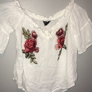 White off the shoulder top with floral embroidery